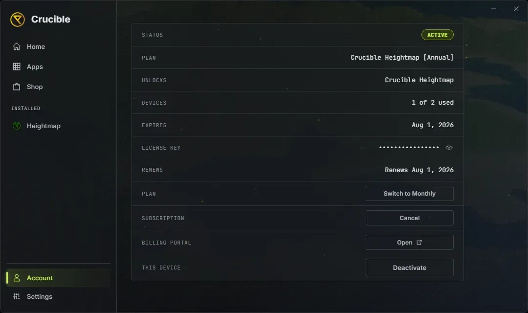 The Crucible launcher Account panel showing an active annual subscription: status, plan, what it unlocks, 1 of 2 devices used, the expiry and renewal dates, a hidden license key with a reveal button, and buttons to switch to monthly, cancel, open the billing portal and deactivate this device