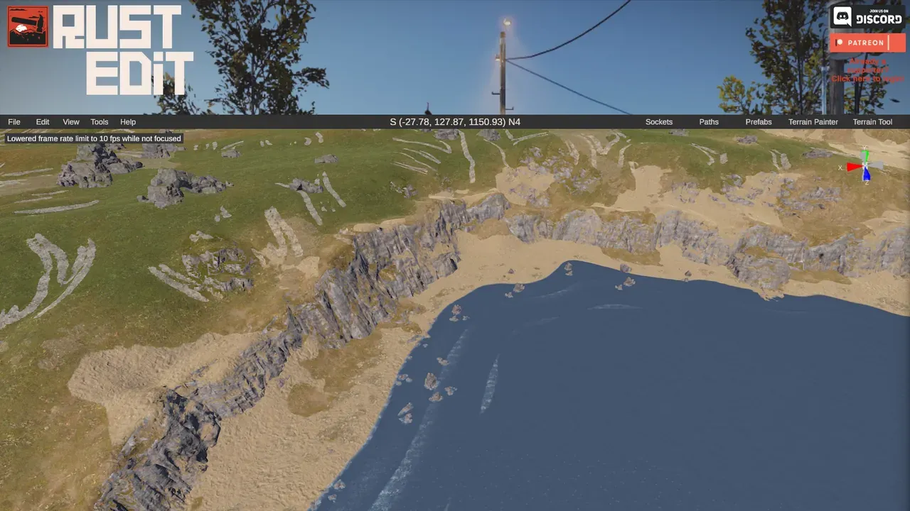 Coastline of the custom Rust map in RustEdit, with cliffs, beaches and splat textures after proc gen